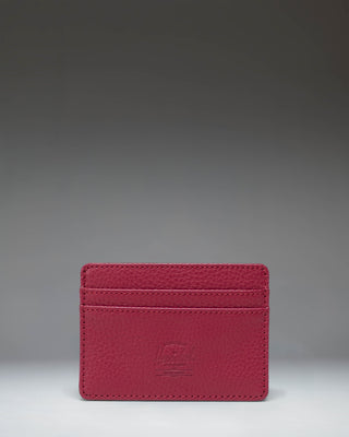 Herschel Supply Co. Charlie Cardholder in Cherry Red vegan leather, showing the compact design with multiple card slots and classic logo tab.