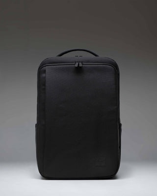 Herschel Supply Co. Kaslo Backpack Tech in black, showing the front view with zippered compartments and shoulder straps.