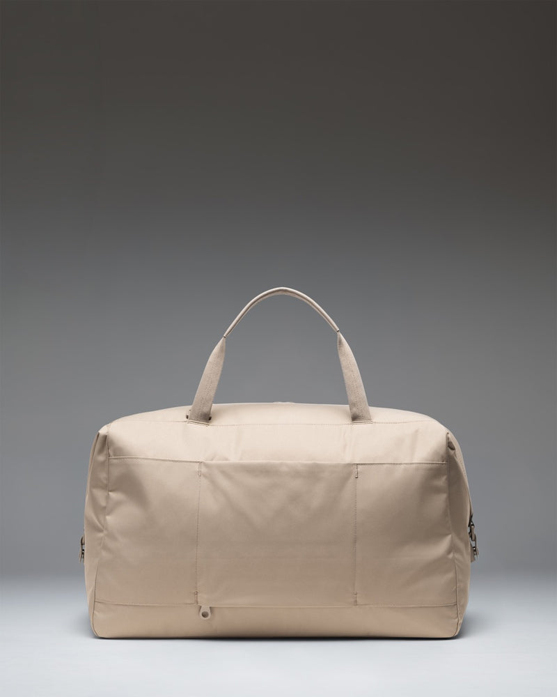 Herschel Supply Co. Maia Weekender bag in Vintage Khaki, featuring a spacious design, dual carry handles, and an adjustable shoulder strap.