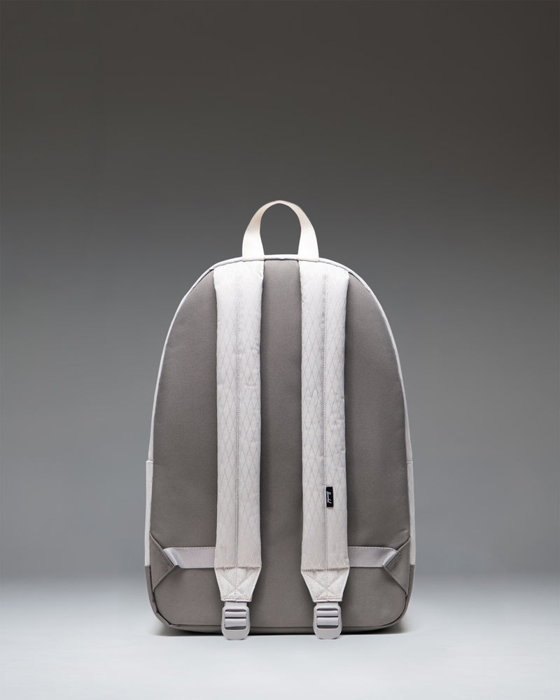 Herschel Classic XL Backpack in Vapor Diamond and Charcoal Gray showing a close-up of the front zippered pocket and fabric texture.
