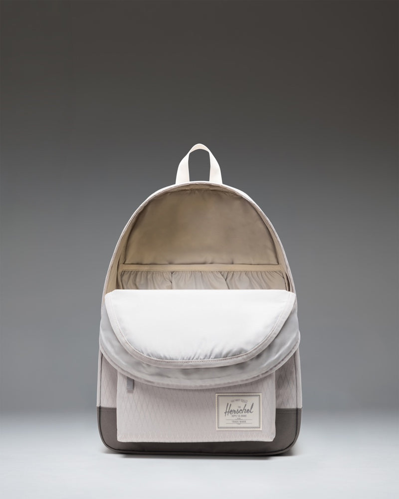 Herschel Classic XL Backpack in Vapor Diamond/Charcoal Gray showcasing its spacious design, dual water bottle pockets, and front storage pocket.
