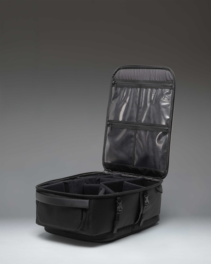 Herschel Supply Co Kaslo Camera Bag Tech in black, showing the front view with zippers and durable material.