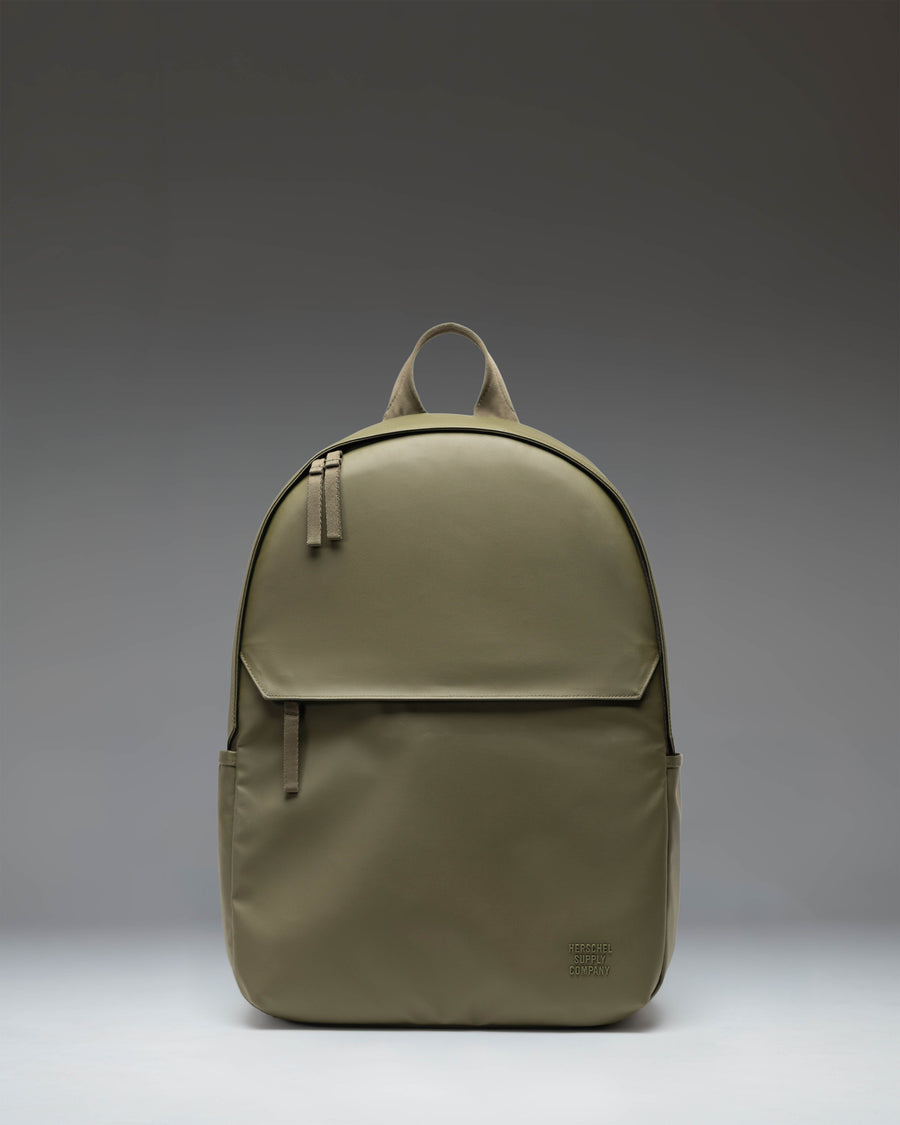 Herschel Supply Co Alberni Backpack in Ivy Green shown from the front, featuring a clean, minimalist design with dual shoulder straps.