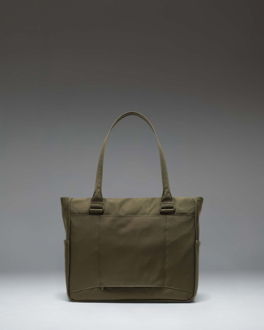 Herschel Supply Co. Kaslo Tote Tech bag in Ivy Green Tonal lifestyle view.