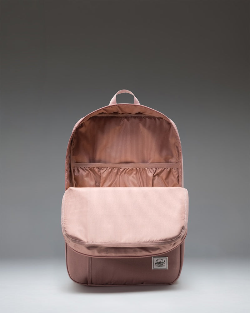 Herschel Supply Co. Wesbrook Backpack in Ash Rose pink, showing a detailed view of the functional design and straps.