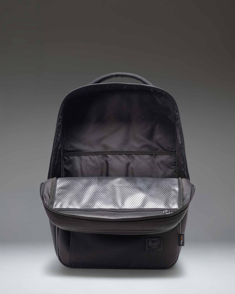 Herschel Supply Co. Black Kaslo Backpack Tech Cordura lifestyle view showing the bag being worn.