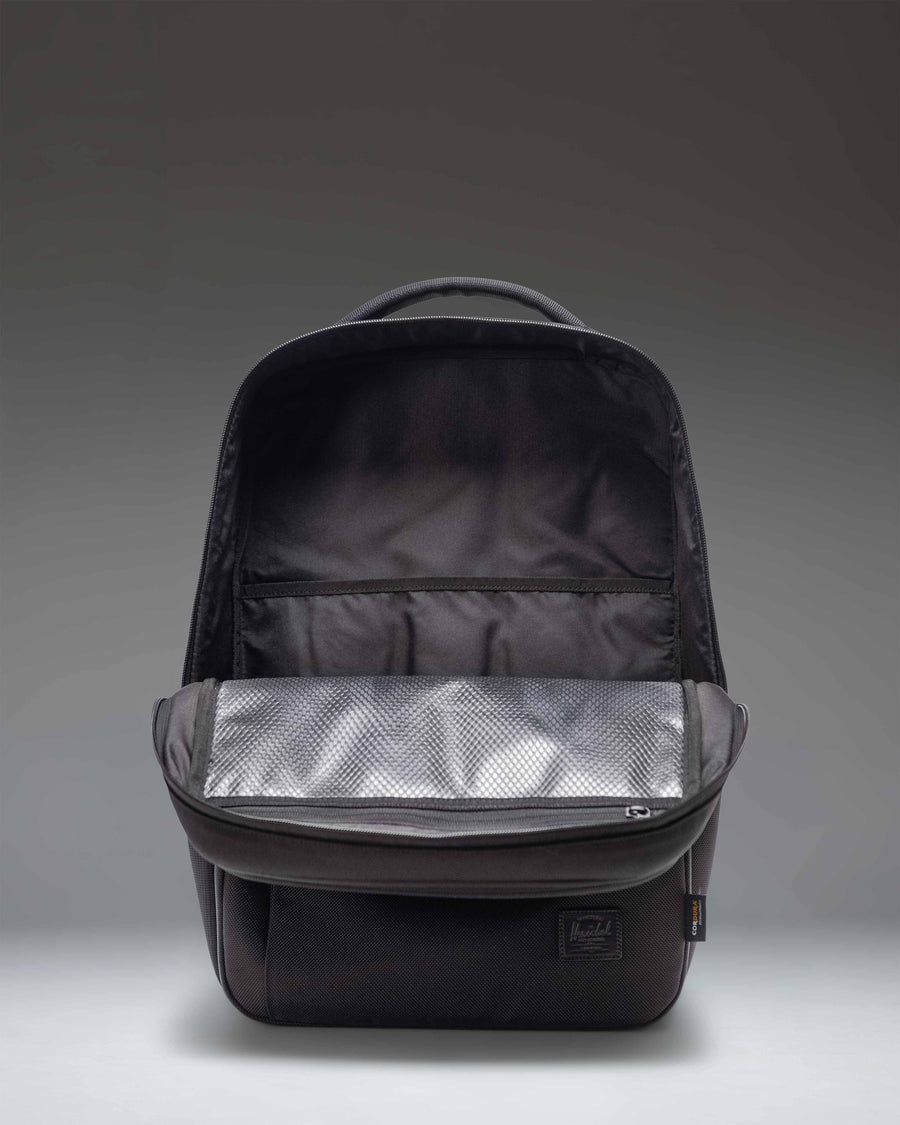 Herschel Supply Co. Black Kaslo Backpack Tech Cordura lifestyle view showing the bag being worn.