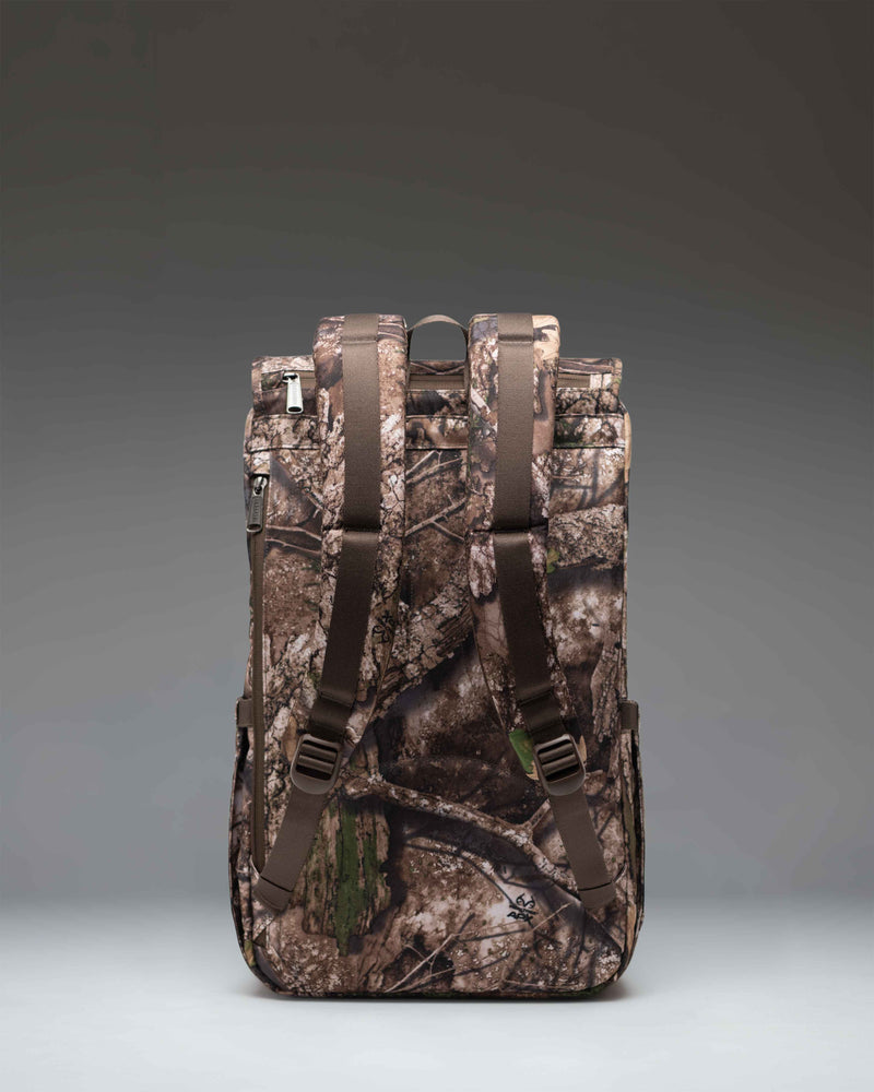 Realtree Herschel Little America Backpack in Realtree APX Camo pattern.