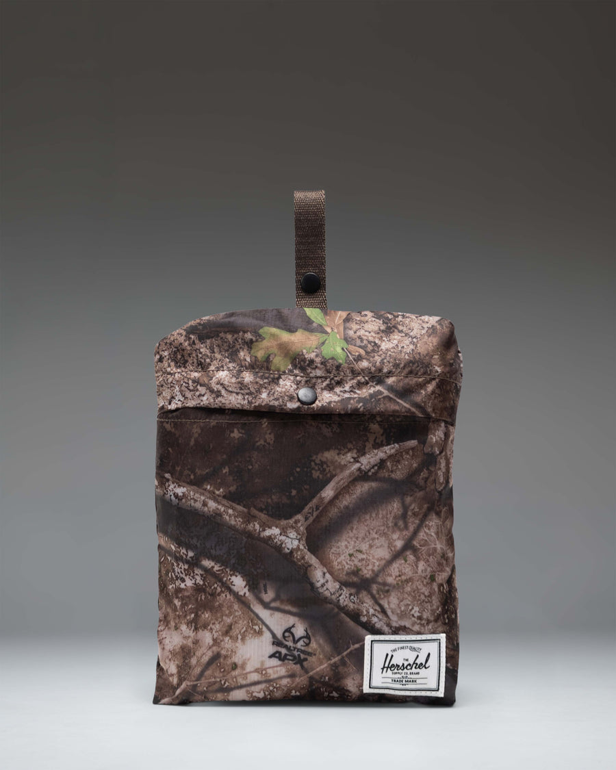 Herschel Supply Co. Realtree Portland Packable Tote bag in Realtree APX Camo.