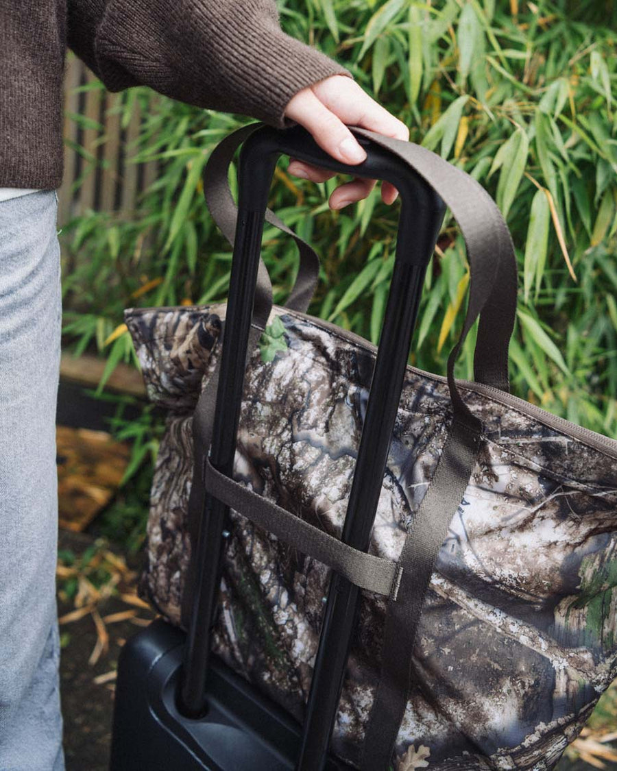 Herschel Supply Co. Realtree Portland Packable Tote in Realtree APX Camo print.