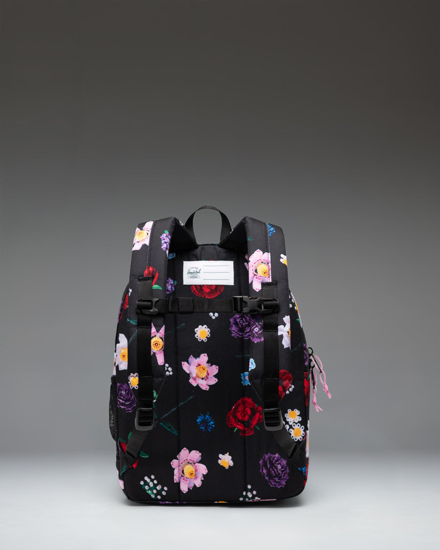 Herschel Supply Co. LEGO Herschel Heritage Kids Backpack in Falling Florals print featuring LEGO brick patterns and vibrant flowers.