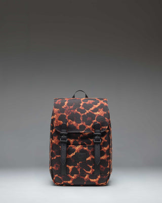 Herschel Retreat Mini Backpack in Digi Leopard print, featuring a clean cylindrical design with a flap closure and rubber strap details.