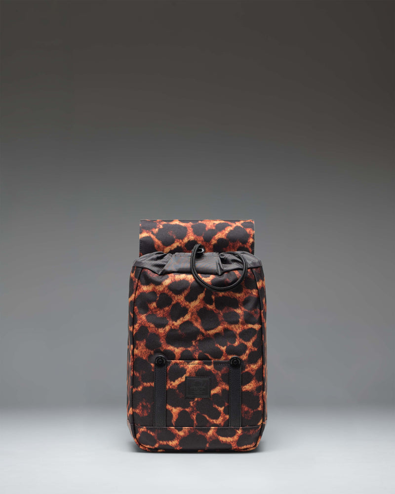 Herschel Retreat Mini Backpack in Digi Leopard print, featuring a main compartment with a drawcord cinch closure and a magnetic strap.