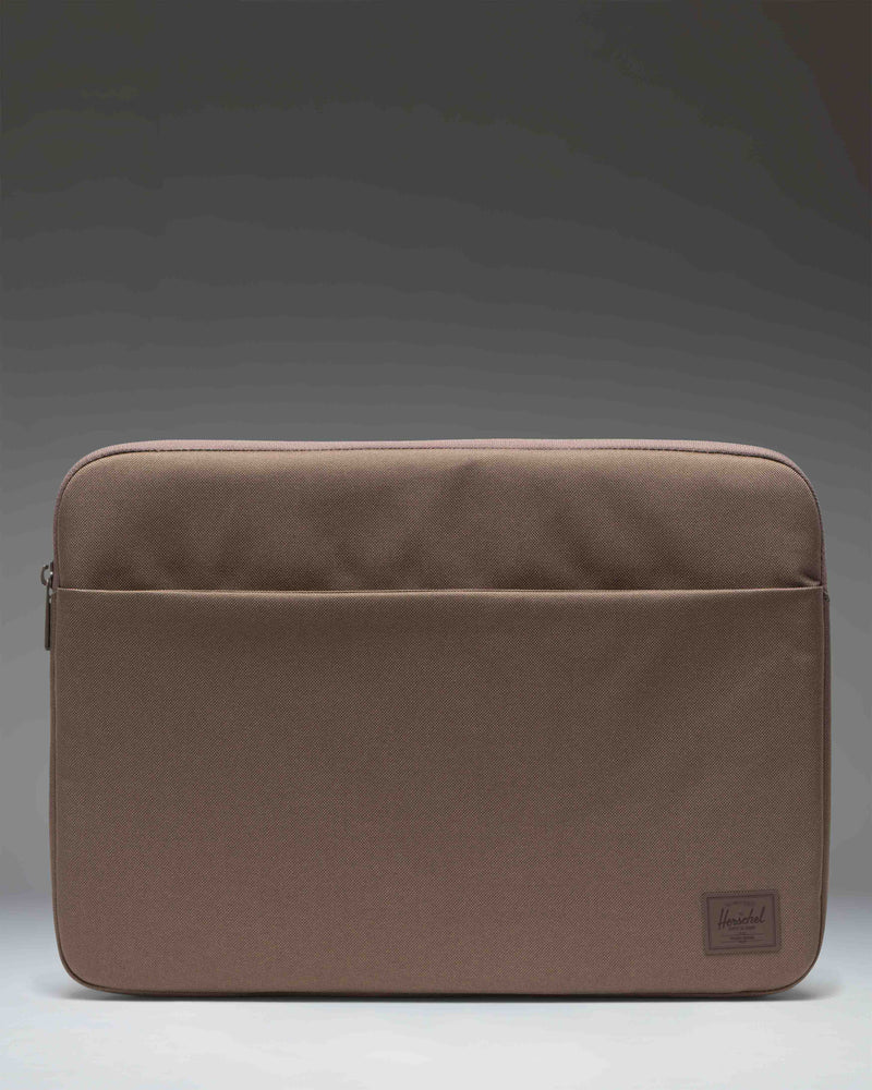 Herschel Supply Co. Denman 15-16 Inch Sleeve Tech laptop case in light brown.