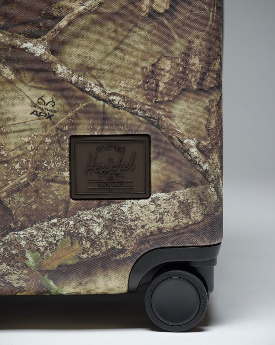 Realtree® Herschel Heritage™ Large CO Luggage