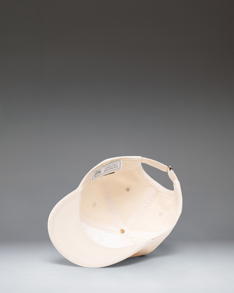 Herschel Supply Co. Sylas Classic Cap in Vintage White. A classic adjustable baseball cap featuring a clean design.