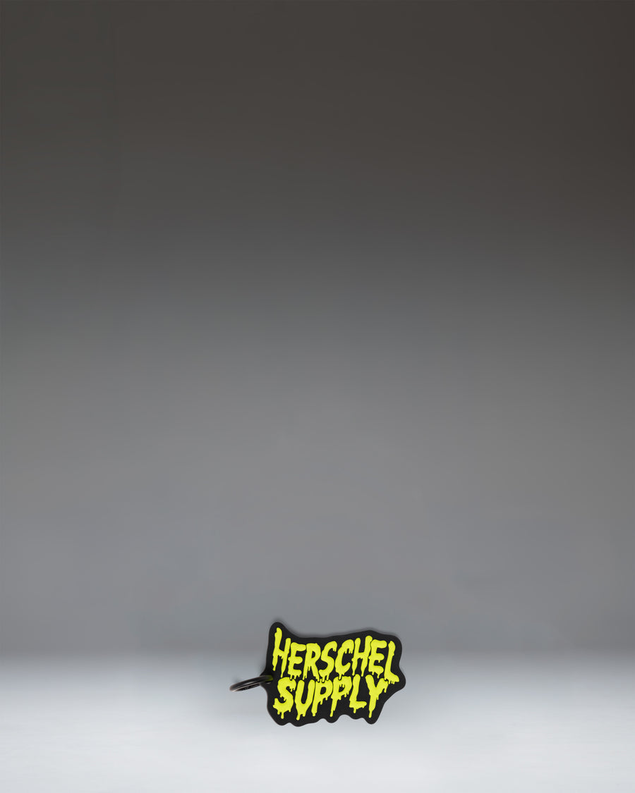 Black Herschel Supply Co. Slime Bag Charm from the Little Herschel collection.