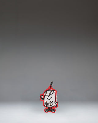 Herschel Supply Co. Sam Bag Charm Little Herschel in Tango Red, a miniature backpack keychain accessory.