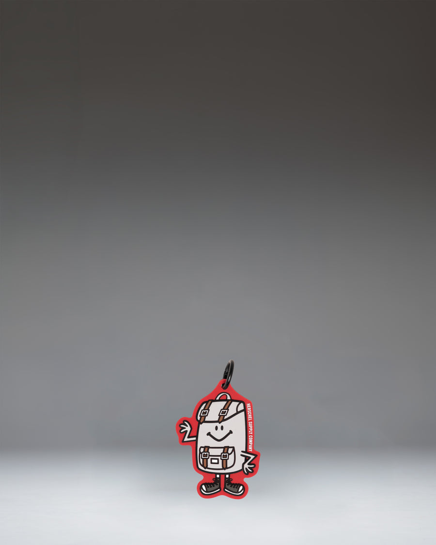 Herschel Supply Co. Sam Bag Charm Little Herschel in Tango Red, a miniature backpack keychain accessory.