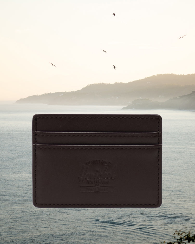 Herschel Supply Co. Charlie Cardholder Leather in brown, showing a sleek, minimalist design with multiple card slots.