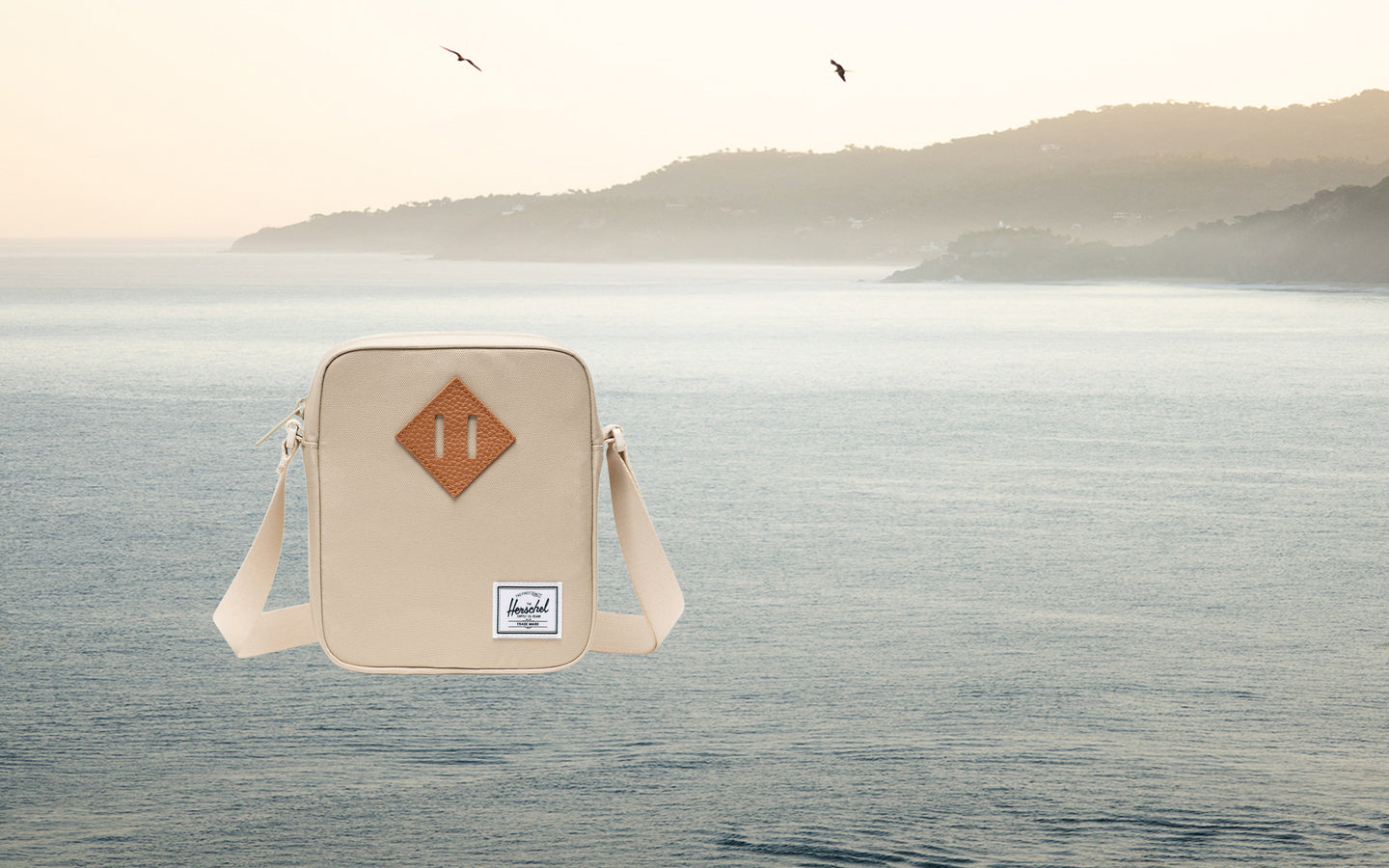 Herschel Heritage Crossbody bag in Eucalyptus green.