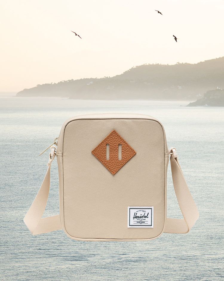 Herschel Heritage Crossbody bag in Eucalyptus green.