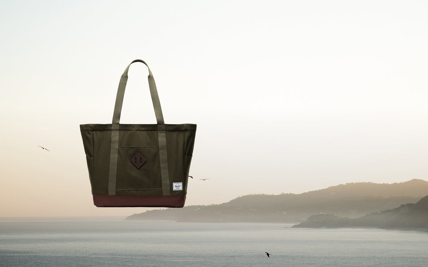 Herschel Heritage Tote bag in Ivy Green and Chicory Coffee brown.
