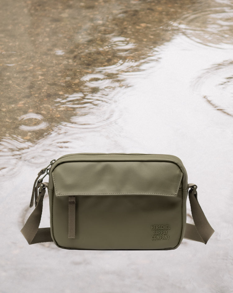 Herschel Supply Co. Alberni Crossbody bag in Ivy Green.