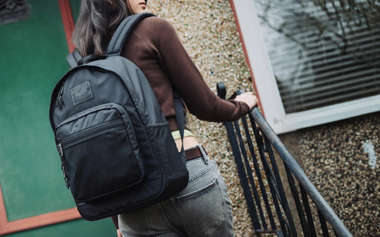 Herschel Supply Co. Kaine Backpack in Black shown from the front against a plain background.