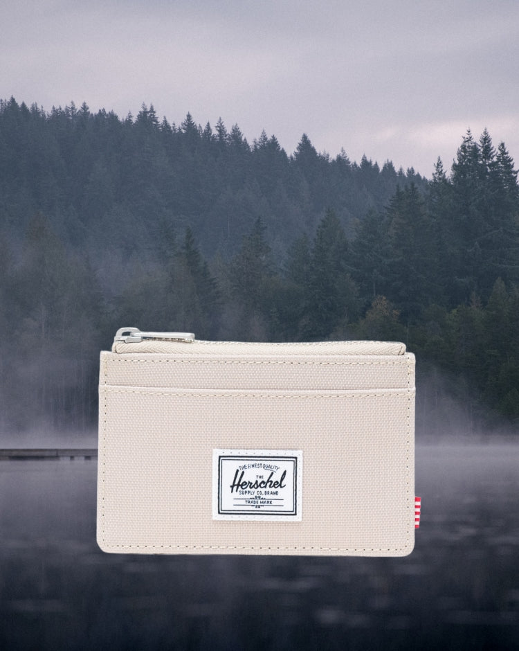Herschel Supply Co. Oscar Cardholder wallet in Eucalyptus green.