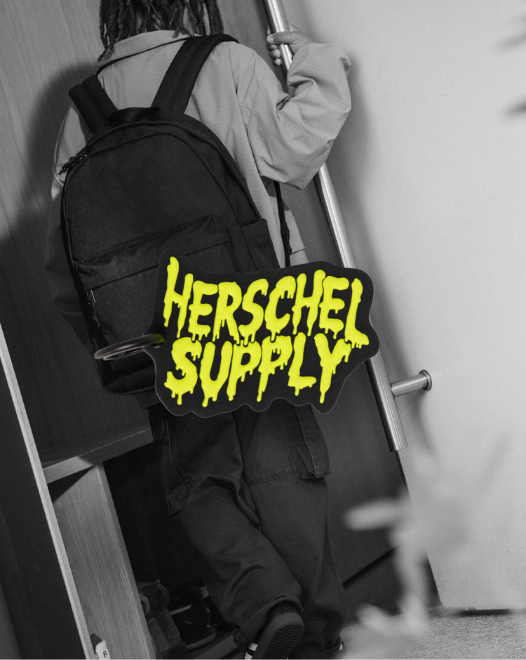 Herschel Supply Co. Slime Bag Charm Little Herschel in black.