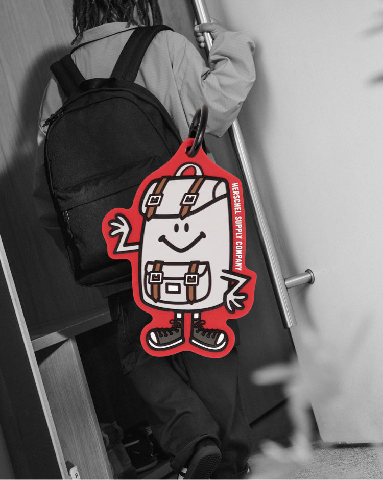 Herschel Supply Co. Sam Bag Charm Little Herschel in Tango Red.