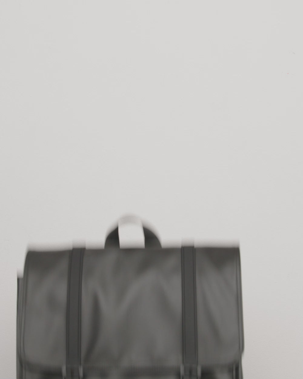 Herschel Survey Backpack video showcasing a model wearing the backpack in different color options.