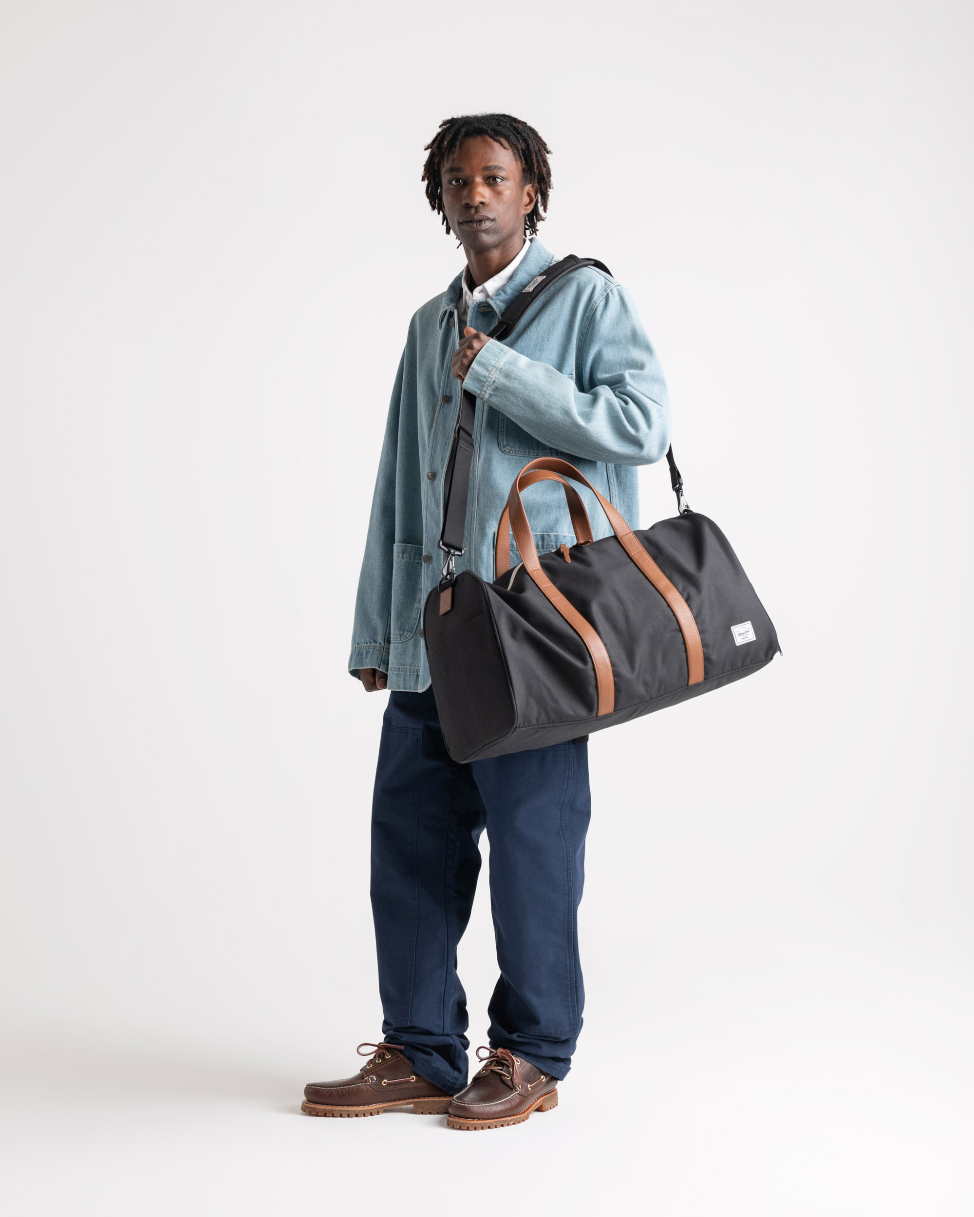 Pink herschel duffle bag new arrivals